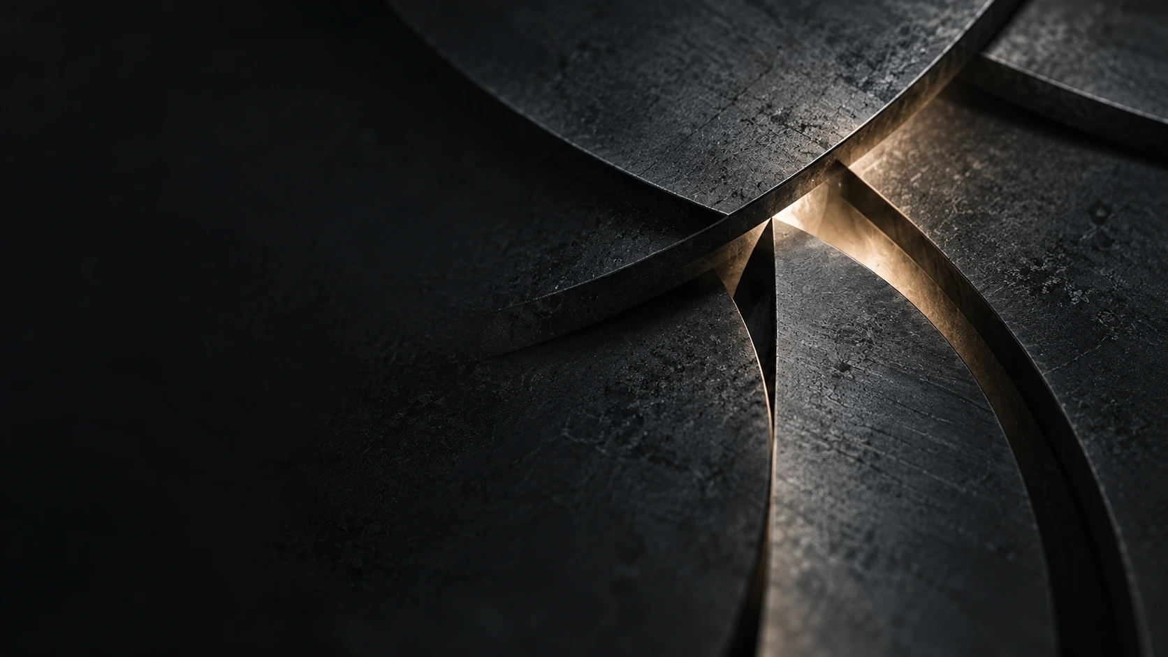 Abstract editorial image of interlocking dark industrial forms meeting at one precisely illuminated interface.